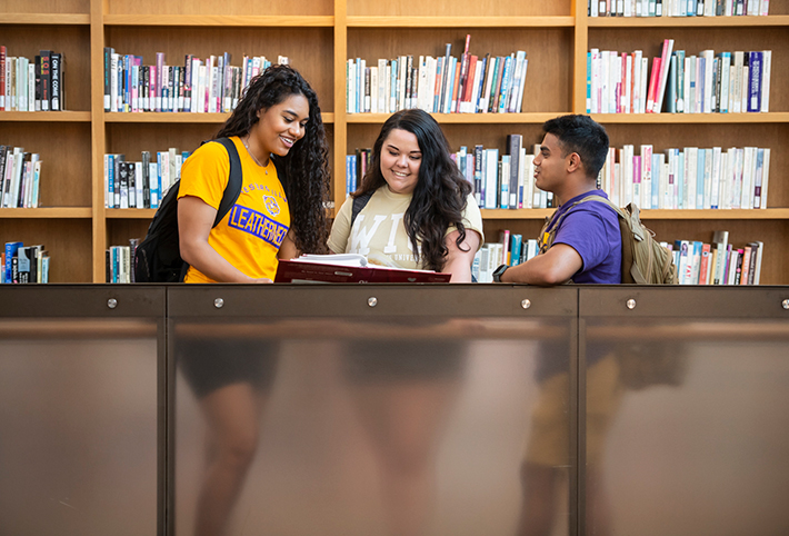 Three students in a library. Link to Gifts That Protect Your Assets. Three students in a library. Link to Gifts That Protect Your Assets.