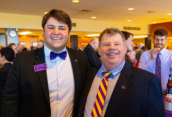 Two men smiling. Link to Tangible Personal Property. Two men smiling. Link to Tangible Personal Property.
