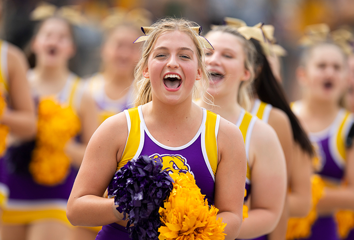 A cheerleader smiling. Links to Gifts by Will A cheerleader smiling. Links to Gifts by Will